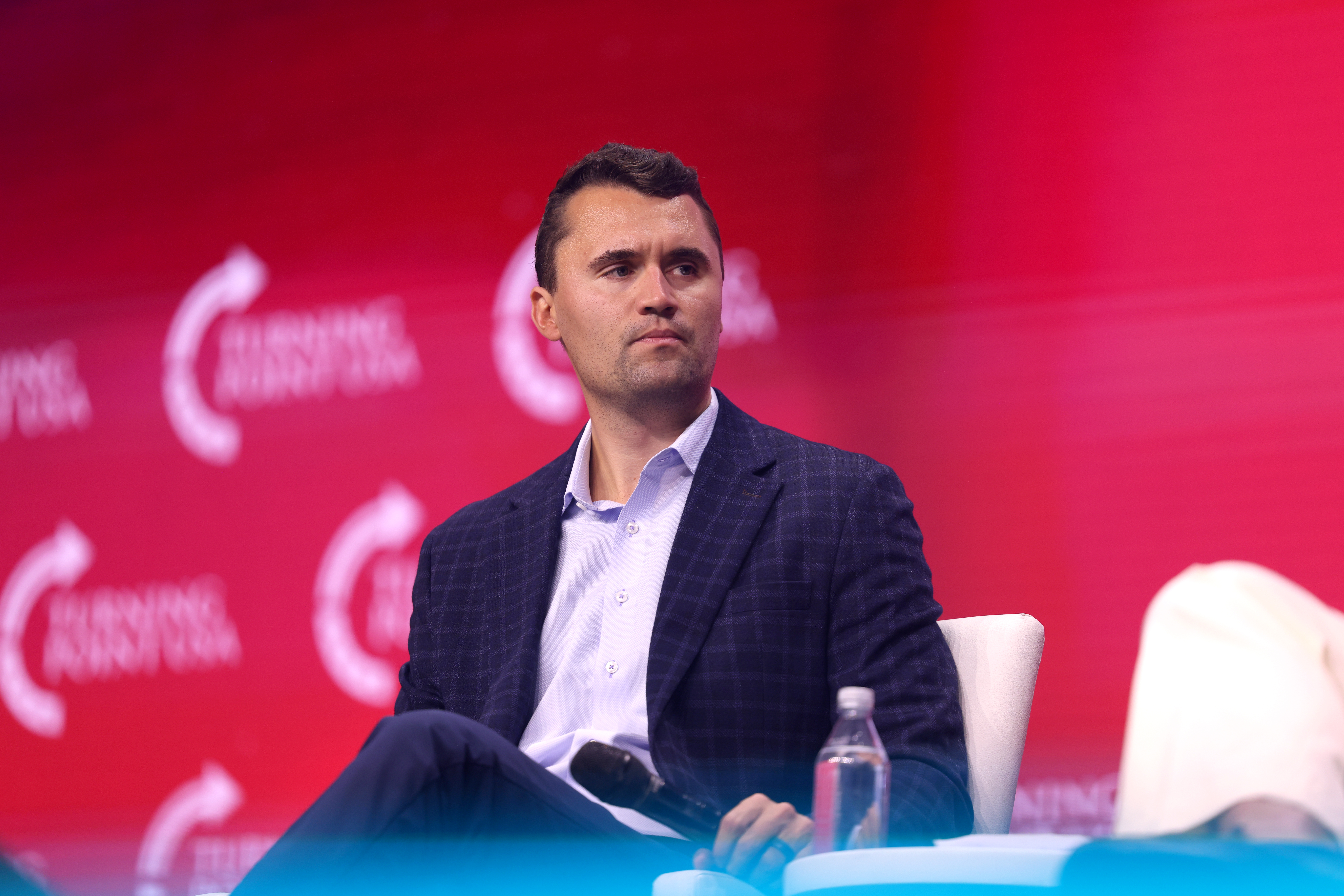 Charlie Kirk speaking at a public event.